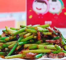 Garlic Shoot Stir-Fry with Pork over Noodles