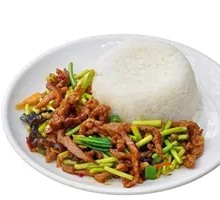 Stir-fried garlic shoots with pork over rice