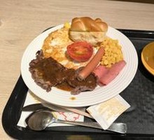 Awakening Steak with Fried Eggs and Side Dishes