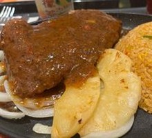 Sizzling Ribeye Steak with Pineapple Fried Rice