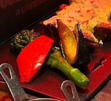 Stone-Grilled New Zealand Sirloin with Flaming Cheese