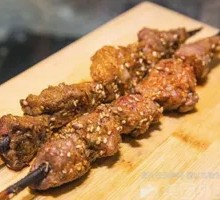Lamb Skewers on Red Willow Wood