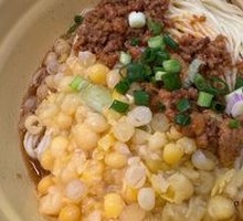 Signature Spicy Broad Noodles with Pea and Pork