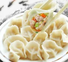 Sour Cabbage and Pork Pan-Fried Dumplings