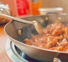 Flame-Infused Duck in Wine Sauce