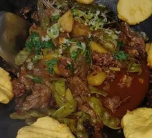 Stewed Pork Ribs and Chicken in Iron Pot