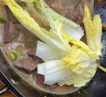 Flame-Grilled Lion Head Goose