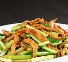 Stir-fried Garlic Shoots with Pork over Rice