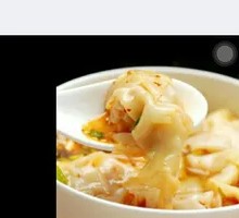 Spicy Pork Dumplings in Red Soup