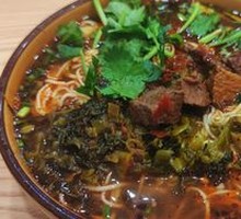 Spicy Sichuan Beef Noodles with Pickled Cabbage