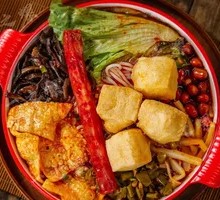 Fermented Rice Noodles with Tofu Puffs and Sausage