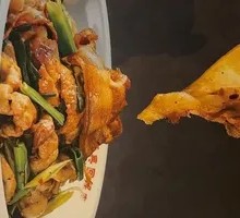 Sautéed Pork with Garlic Shoots
