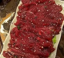 Sliced Beef with Green and Red Peppers