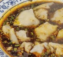 Spicy Pork Dumplings in Red Soup
