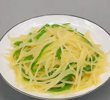 Sliced Potatoes with Green Pepper