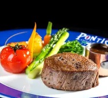 Grilled Beef Tenderloin with Roasted Potato and Vegetable Sauce