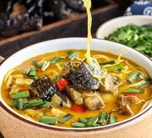 Black Chicken Sour Spicy Golden Noodle Soup
