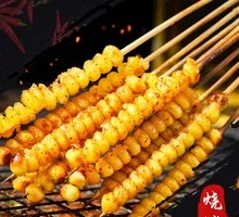 Charcoal-Grilled Corn on Skewers