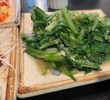 Garlic-dressed Pea Shoots