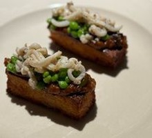 Squid with Sweet Peas and Eggplant Purée on Toast