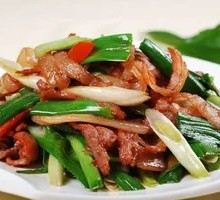 Sautéed Pork with Garlic Shoots