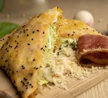 Double Egg Bacon and Sesame Seed Pancake