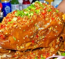 Sauce-Drizzled Lamb Head