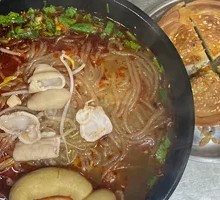 Fatty Intestine Noodles with Pickled Vegetables and Crispy Bao