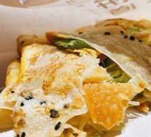 Double Egg Bacon and Sesame Seed Pancake