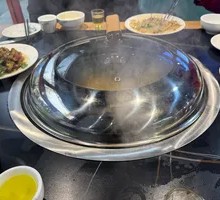 Northeastern Stewed Rooster in Iron Pot