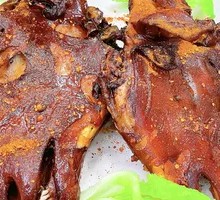 Signature Braised and Roasted Lamb Head