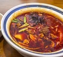 Spicy Tomato Braised Pork Rice Noodles