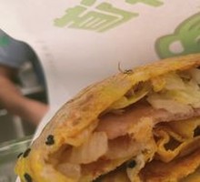 Double Egg Bacon and Sesame Seed Pancake