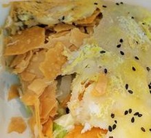 Double Egg Bacon and Sesame Seed Pancake