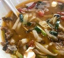 Snow Cabbage and Pork Noodles with Rice Cake
