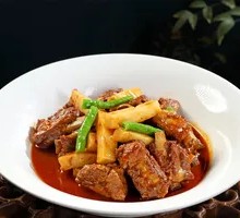 Black Pork Chop Stewed with Rice Cake