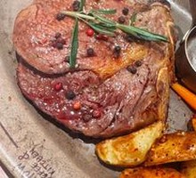 Charcoal-Grilled Grain-Fed Tomahawk Steak