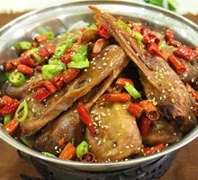 Spicy Braised Duck Heads in Dry Pot