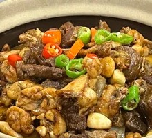 A Wei's Charcoal-Grilled Beef Brisket with Frog