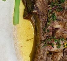 Charcoal-Grilled Grain-Fed Tomahawk Steak