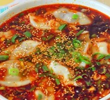 Scallion Pork Sour Spicy Soup Dumplings
