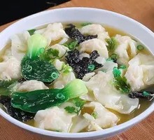 1 Medium Bowl of Freshly Made Wontons + 1 Signature Pork Baozi