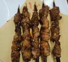Lamb Skewers on Red Willow Branches