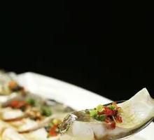 Steamed Bighead Carp with Yellow Pepper Sauce