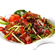 Stir-Fried Garlic Shoots with Chinese Sausage over Rice