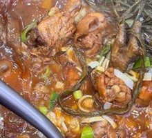 Stewed Rooster in Iron Pot