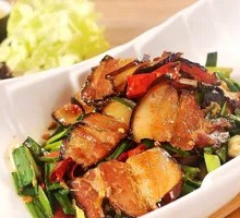 Garlic Shoots with Chili and Preserved Pork