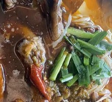 Spicy Pickled Duck Feet Noodles