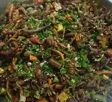 Squid Tentacles with Wild Greens