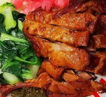 Spicy Duck Leg with Burnt Chili Rice Bowl